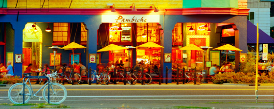 A warm summer night at a vibrantly hued Cuban restaurant in northeast Portland - Lots of bicycle parking!