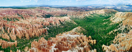 Inspiration Point overlooks a huge stone amphitheater lined with colorful "hoodoos" up to 200 feet tall,  formed by frost and stream erosion. A truly inspirational spot!