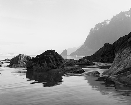 Early morning at Hug Point State Park on the Oregon coast near Arch Cape.  The park is named for the way wagons had to get around the point on a path carved out of rock. 