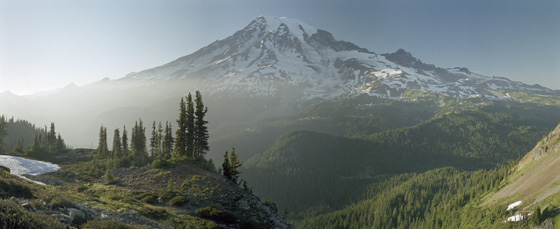 Mt Rainier just before the sun disappeared behind the horizon from Plummer Peak.  After a long day of hiking above Ramparts Ridge in Mt Rainier National Park,  I finished off the day with another walk from Reflection Lake up to the Tatoosh Range just to the south of Rainier.  Clouds were moving in from the west.  You can see Paradise Lodge in the middle of the photo. 