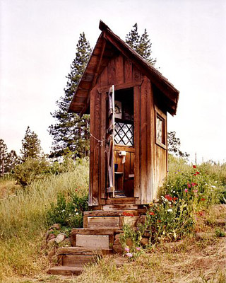 High class outhouse at Ekone Ranch near Goldendale,  Washington. The outhouse's windows are to the east,  so the morning sun shines in on your back as you sit with your cup of coffee and a magazine. You can really settle in. The dutch door allows you to watch the stream running past out in front while keeping a modicum of privacy. Ekone ranch has horse camps for kids.