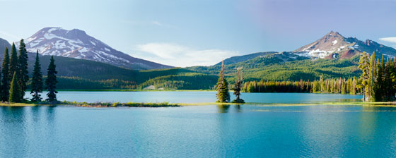 Late afternoon view of Sparks Lake near Mt Bachelor in Central Oregon,  with South Sister and Broken Top.