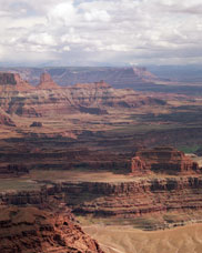 View of rain showers over the Colorado River Near Moab, Utah