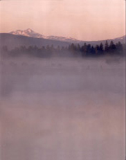 Broken Top, South Sister,  North Sister and Black Crater from a misty pond