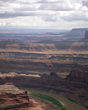 View of rain showers over the Colorado River Near Moab, Utah