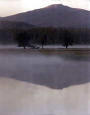 Broken Top, South Sister,  North Sister and Black Crater from a misty pond