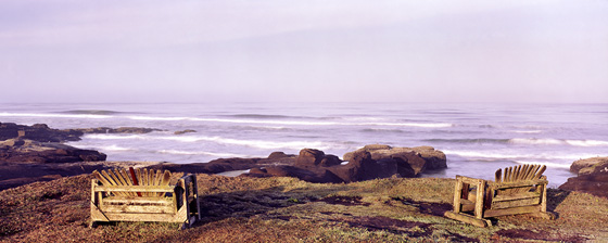 Old lichen covered benches providing a view over the ocean at Yachats,  Oregon.  "Yachats,  pronounced YAH-hots,  is derived from the Chinook Indian word,  Yahuts,  meaning dark waters at the foot of the mountain.  Nestled between the lush forested mountains of the Coast Range and the lapping waves of the Pacific surf,  the charming village of Yachats opens a window to the world." (www.yachats.org)